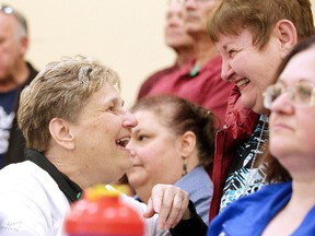 Collette Jones chats with a well-wisher at a fundraising auction for her in Sudbury, Ont. on Sunday March 25, 2018. The 57-year-old Sudbury woman requires a kidney transplant and an emergency fundraiser was held to raise funds for her. The event was organized by  Bob Johnston and Gerry Montpellier. Gino Donato/Sudbury Star/Postmedia Network