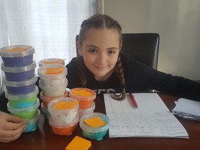 Amber Robertson, 10, is raising money for a YMCA autism summer camp program by selling slime she makes in her mother's kitchen in Sarnia. Her goal is to raise $500. (Handout)