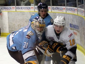 Jordan Biro fights his way past Storm goaltender Charles Olivier Levesque in a past game.