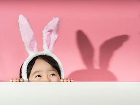 Little girl with rabbit ears headband