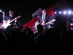 See Spot Run played King George VI school in Sarnia Thursday and astronaut Chris Hadfield recorded a video message as a reward for the school's fundraising drive to help the Sarnia and District Humane Society. Guitarist Randy Bowen, left, smiles as students jump along to the music.  Tyler Kula/Sarnia Observer/Postmedia Network