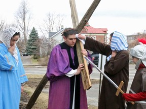 BRUCE BELL/THE INTELLIGENCER
 
A woman wipes the face of Jesus during Easter celebrations at St. Thomas Anglican Church on Friday morning. This year the church celebrated Good Friday with the presentation of The Way of the Cross, including 14 stations depicting different scenes from the crucifixion of Jesus.