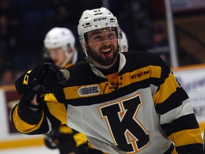 Kingston Frontenacs winger Ryan Cranford, bleeding from the lip after taking a puck to the face, celebrates the game-winning goal against the North Bay Battalion during the third period of Game 4 of their Ontario Hockey League Eastern Conference quarter-final at Memorial Gardens in North Bay on Thursday. Kingston won 6-3 to take a 3-1 lead in their best-of-seven series, which heads back to Kingston for Game 5 on Saturday. (Dave Dale/Postmedia Network)