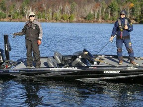 Columnist Frank Clark on a fall fish with local angler Mike Gifford. Clark would prefer having Gifford in his boat where he can keep a close eye on the highly competitive pro. Photo supplied