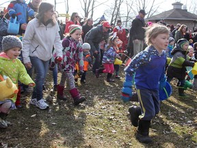 Children run for Easter eggs at Easter in the Park in Canatara Park Saturday in Sarnia. Thousands were expected to attend the annual Easter weekend event. Tyler Kula/Sarnia Observer/Postmedia Network