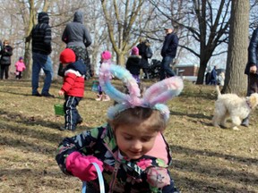 Liahna King, 3, collects an egg at the Kinette Club of St. Marys Easter egg hunt on Saturday, March 31, 2018 in St. Marys, Ont. Terry Bridge/Stratford Beacon Herald/Postmedia Network