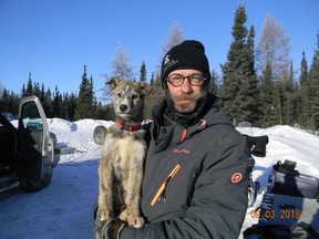 Oliver “Brokentooth” Solaro with the three-month-old puppy he received from a musher in Churchill, Man. Solaro has named the pup Bruce Springsteen. (SUPPLIED PHOTO)