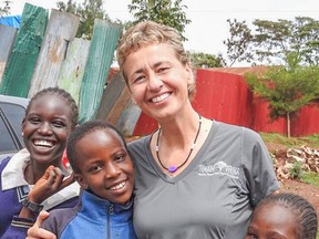 Jeannine Jefferson, and young friends, during Tumaini Afrika's recent trip to Kenya in February and March.