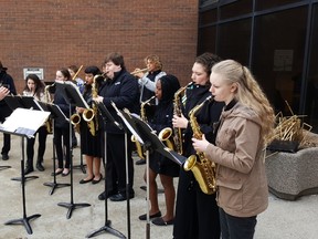 Under the direction of Christine Baribeau, the Chatham-Kent Secondary School jazz band performs outside the Civic Centre for Tuesday's flag-raising ceremony for the Kiwanis Music Festival. (Trevor Terfloth/The Daily News)