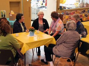 A group of caregivers interacts with each other during a community event organized by group members of the Connecting the Dots for Caregivers program – an initiative that aims to improve the conditions of family caregivers in Huron and Perth counties. JONATHAN JUHA/THE BEACON HERALD/POSTMEDIA NETWORK