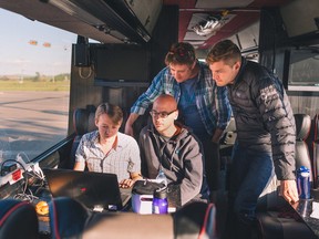 Photo by Laura Beauchamp.
From left, Patrick O’Connor, Chris Beauchamp, Gordie Haakstad, and Steadicam operator Aaron Hultin review footage during production of "Fly Home" in 2017