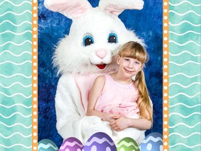 Madison Lee poses for a photo with the Easter Bunny (Renee Sawchuk) at Rexall Drugstore on Saturday March 24.