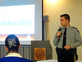 Staff Sgt. Jeremie Landry speaks at the policing open house last Friday.