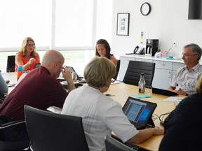 Members of the Elgin-St. Thomas Board of Health discuss an expert panel review last September. The public health unit will now move forward with a proposed merger with Oxford County following provincial approval. (Louis Pin // Times-Journal)