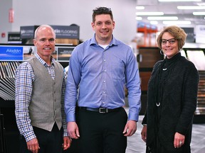 Sacwal Flooring Centres staff members Brent Webb, sales, Josh Smulders, operations manager, and Alanna Aarssen, president, are shown inside the new Chatham location on St. Clair Street April 4, 2018. Sacwal, Ideal Decorating and Lighting & Accent Gallery were hit by the fire in January 2017. The first two stores have now reopened at the original location and a new store called The Lighting Shoppe has taken the place of the third. (Tom Morrison/Postmedia Network)