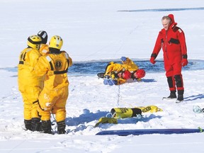 The Vulcan Fire Department hosted an ice-rescue course that internationally certified 12 training officers from 12 different departments, including three local ones. Here, trainers demonstrate their ice-rescue skills at the pond in town. Jasmine O'Halloran Vulcan Advocate