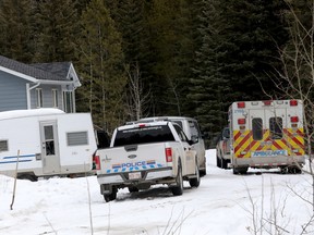 RCMP investigate a home in Morley where 10 children and four adults were taken to hospital in Calgary on Wednesday April 4, 2018. Darren Makowichuk/Postmedia