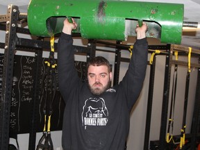 Max Boudreault, a personal trainer and owner of the Stay Strong fitness studio in Timmins, lifts a Log Press over his head. It’s one of the implements that will be part of the strongman competition being held in Timmins May 4 to 6. It will be the first time Timmins has hosted such an event.