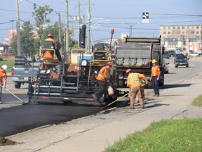 File photo showing Miller Paving employees at work in Timmins. Miller has submitted the lowest tender for the City of Timmins summer paving program asphalt supply, at a cost of $508,324.  “Just to point out, that is significantly under what our estimate was, so it is good news for council. Our estimate was over $660,000,” said Timmins Mayor Steve Black. Council is expected to approve the tender later this month.