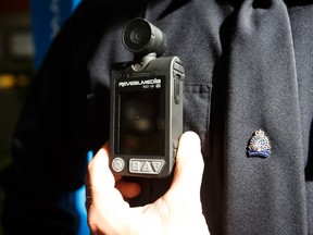 A police body-worn camera is held by an officer in Edmonton.
Ian Kucerak/Postmedia Network