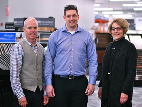 Sacwal Flooring Centres staff members Brent Webb, sales, Josh Smulders, operations manager, and Alanna Aarssen, president, are shown inside the new Chatham facility on St. Clair Street on Wednesday. Sacwal, Ideal Decorating and Lighting & Accent Gallery were hit by the fire in January 2017. The first two stores have now reopened at the original location and a new store called The Lighting Shoppe has taken the place of the third. Tom Morrison/Chatham This Week