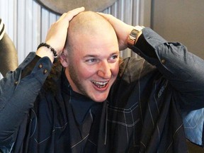 Fort resident James Seeber raised more than $3,000 for the Canadian Cancer Society. He went all the way in his pledge to cut his hair by having his head shaved by Concrete Blonde and Barbers’ own Kyle Backus.