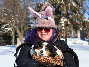Rebecca Giasson and her dog, Emmabean, took part in a march protesting the use of animal testing in cosmetics in Sudbury, Ont. on Thursday April 5, 2018. John Lappa/Sudbury Star/Postmedia Network