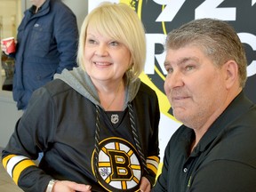 Hall of Fame defenceman Ray Bourque signed the crest on Louise Bennetts’ Boston Bruins jersey during an autograph session at Kia of Timmins Thursday afternoon.  Bourque was in the city to attend the 2018 Timmins Rock Celebrity Sports Dinner/Silent Auction Fundraiser in the McIntyre Ballroom Thursday night. See Saturday’s edition of The Daily Press for additional coverage from that event.  THOMAS PERRY/THE DAILY PRESS