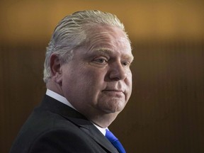 Ontario Conservative leader Doug Ford takes questions from journalists during a pre-budget lock-up as the Ontario Provincial Government prepares to deliver its 2018 Budget at the Queens Park Legislature in Toronto on Wednesday, March 28, 2018. Ford will not bring journalists with him on the campaign trail this spring, a rare move experts say suggests the Tories are keen to keep the unpredictable populist politician out of the hot seat as he takes on two more seasoned rivals. THE CANADIAN PRESS/Chris Young