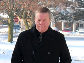 Former Chatham-Kent Police Service officer Robert Mugridge has been granted a final adjournment in his fraud trial to give him more time to make some restitution to victims. He is seen here walking into court on January 9, 2018, when the first adjourment was requested to give him time to make restitution. File photo/Chatham Daily News/Postmedia Network