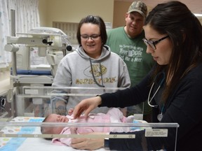 Everleigh Roberts is settled into a warming table by registered nurse Laura Gagain while parents Christine Villeneuve and Adam Roberts look on. Baby Roberts, who was going home to Iroquois Falls on Friday, was almost one day old when the photo was taken. This year’s Timmins and District Hospital Foundation Spring Gala will raise funds for maternity items like a new warming table.