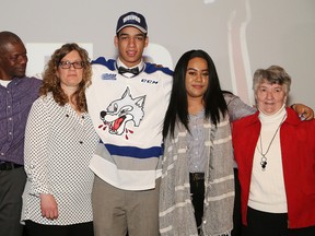 Quinton Byfield, Sudbury Wolves' first overall pick in the OHL draft, poses for a photo with his parents, Clinton Byfield and Nicole Kasper, sister Chloe and his Oma, Hilde Kasper, at a press conference introducing Quinton to the community in Sudbury, Ont. on Friday April 6, 2018. John Lappa/Sudbury Star/Postmedia Network