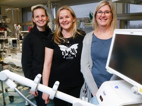 Luke Hendry/The Intelligencer
Butterfly Girls, Loralee McInroy, left, and Barb Matteucci, centre, join patient care lead Lynne Allan with a new ventilator Friday at Belleville General Hospital. The BGH Foundation purchased the machine, worth more than $57,000, with funds raised by the Butterfly Run, which was founded by Beth Primeau, McInroy and Matteucci.