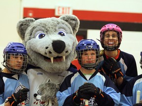 The Sudbury Miners, a Special Olympics floor hockey team, competes against the Cops to Conquer Cancer, a group of local police officers, at St. Francis Catholic Elementary School on Wednesday, April 4, 2018. Ben Leeson/The Sudbury Star/Postmedia Network