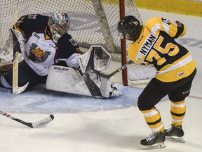 Barrie Colts goaltender Leo Lazarev, seen giving up a goal to Kingston Frontenacs' Linus Nyman in a game on Feb. 19 at the Rogers K-Rock Centre, made 40 saves on Friday night at the Colts downed the Frontenacs 4-1 in Game 2 of their Ontario Hockey League Eastern Conference semifinal in Barrie. (Julia McKay/Whig-Standard/Postmedia Network)