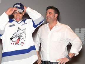 Dario Zulich, owner of the Sudbury Wolves, looks on as Quinton Byfield is introduced as the Sudbury Wolves' first overall pick in the OHL draft at a press conference in Sudbury, Ont. on Friday April 6, 2018. John Lappa/Sudbury Star/Postmedia Network