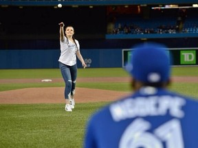 Amara Ruffo throws the first pitch at the Blue Jays’ game against the Chicago White Sox on Monday. The Jays Care Foundation’s Girls at Bat participant is encouraging leadership skills in her home community of Chapleau Cree First Nation.
