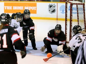 The Kilsyth Young Guns' Haleigh Weppler, No. 33, tries to sneak a shot past Big River Crusader goaltender Michelle Kennedy in the first half of the Kilsyth and Big River A-side bronze medal game at the 2018 Juvenile Broomball Canadian National Championships in Owen Sound on Saturday