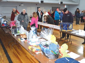 Photo by KEVIN McSHEFFREY/THE STANDARD
There was a steady stream of people entering the Collins Hall for the Elijah Hennessey fundraiser from 9 a.m. to 4 p.m. on Saturday. The event has a barbecue, bake sale, yard sale, silent auction and live auction.