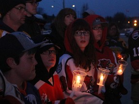 Krys Rodmell and her children Dylan, Madison and Cam, were among more than 200 people at Memorial Gardens Sunday night to pay tribute to the 15 people who were killed Friday when a bus carrying the Humboldt Broncos collided with a transport. Fourteen others on the bus suffered injuries in the crash.
PJ Wilson/The Nugget