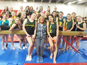 The Centennial Chargers gymnastics team, shown with coach Deb Clare at the recent Bay of Quinte championships at the QBGC, will send 25 athletes to COSSA next week. (Submitted photo)