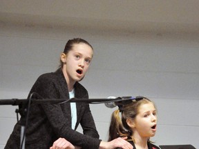 Sisters Katherine (left) and Julia Havenga were just one of 20 top notch musical performances during the Concert of Stars last Friday, April 6 at the Mitchell & District Community Centre, concluding the 10-day 72nd annual Optimist Club of Mitchell Music Festival. Later in the evening, their dad Ed – and pianist for this song – was presented with the Mary Ellen & Joseph Delaney Memorial Award for longtime contributions to the festival and to the musical community at large. ANDY BADER/MITCHELL ADVOCATE