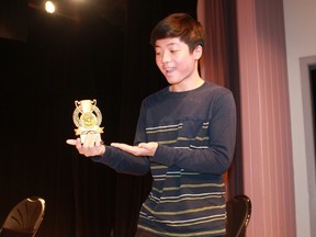 Sarnia Spelling Bee Grade 7/8 champ and Lansdowne Public School student Aiden Vu-Nguyen hoists his trophy in the air following a spelling bee at the Sarnia Public Library Theatre on March 29.
CARL HNATYSHYN/SARNIA THIS WEEK