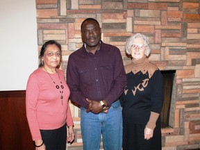 Lambton College nursing graduate Christopher Omira (centre) spoke about his life and his efforts to improve the lives of people in his western Kenyan hometown, during a presentation to the Rotary Club of Sarnia Bluewaterland on March 28.
CARL HNATYSHYN/SARNIA THIS WEEK