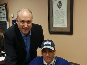 Sudbury Wolves general manager Rob Papineau poses for a photo with newly-signed centre Quinton Byfield, the first-overall pick in the OHL Priority Selection on Saturday. Photo supplied