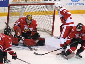 Olivier Lafreniere makes a stick save in the first period of Game 3 between the Owen Sound Attack and Sault Ste. Marie Greyhounds on Monday night at the Harry Lumley Bayshore Communtiy Centre. Lafreniere made 28 saves on 30 shots to backstop the Attack to the 6-2 victory. Greg Cowan/The Sun Times.