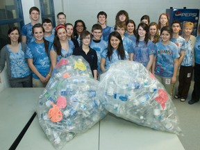 Members of the Geography Environment Club and the Social Justice Club at London’s Catholic Central Highschool collected over 700 water bottles from school blue boxes during a one-month period in 2011. They did so to demonstrate to fellow students just how much plastic is used and how much money is wasted because they have several water fountains throughout the school. The group was selling re-usable water bottles during the period of Lent. Proceeds would help sponsor a well in Africa. File photo/Postmedia Network