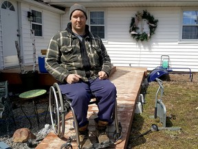 Shawn Daley, of Gregory Line just outside of Chatham, is shown beside the spot where his ATV was parked. It was stolen from his driveway overnight on Easter Sunday. (Trevor Terfloth/The Daily News)