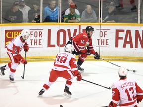 All eyes are on the Owen Sound Attack's Kevin Hancock as he looks for a team mate in front of the net during Monday night's Game 3 between the Attack and Sault Ste. Marie Greyhounds in Owen Sound. Hancock now sits second on the Attack in playoff points with five goals and five assists. Greg Cowan/The Sun Times