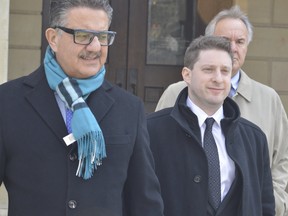 Mark Phillips, right, was given a conditional release after he plead guilty to attacking an immigrant family in a St. Thomas parking lot with a baseball bat last December. Phillips will have to complete 240 volunteer hours and is subject to three years of probation. (LOUIS PIN, Times-Journal)